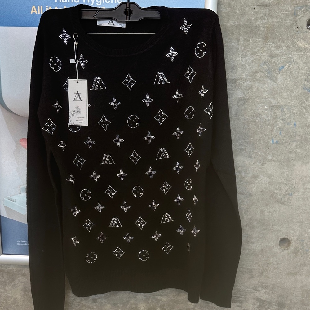 Chic Black Sweater with Silver Patterns